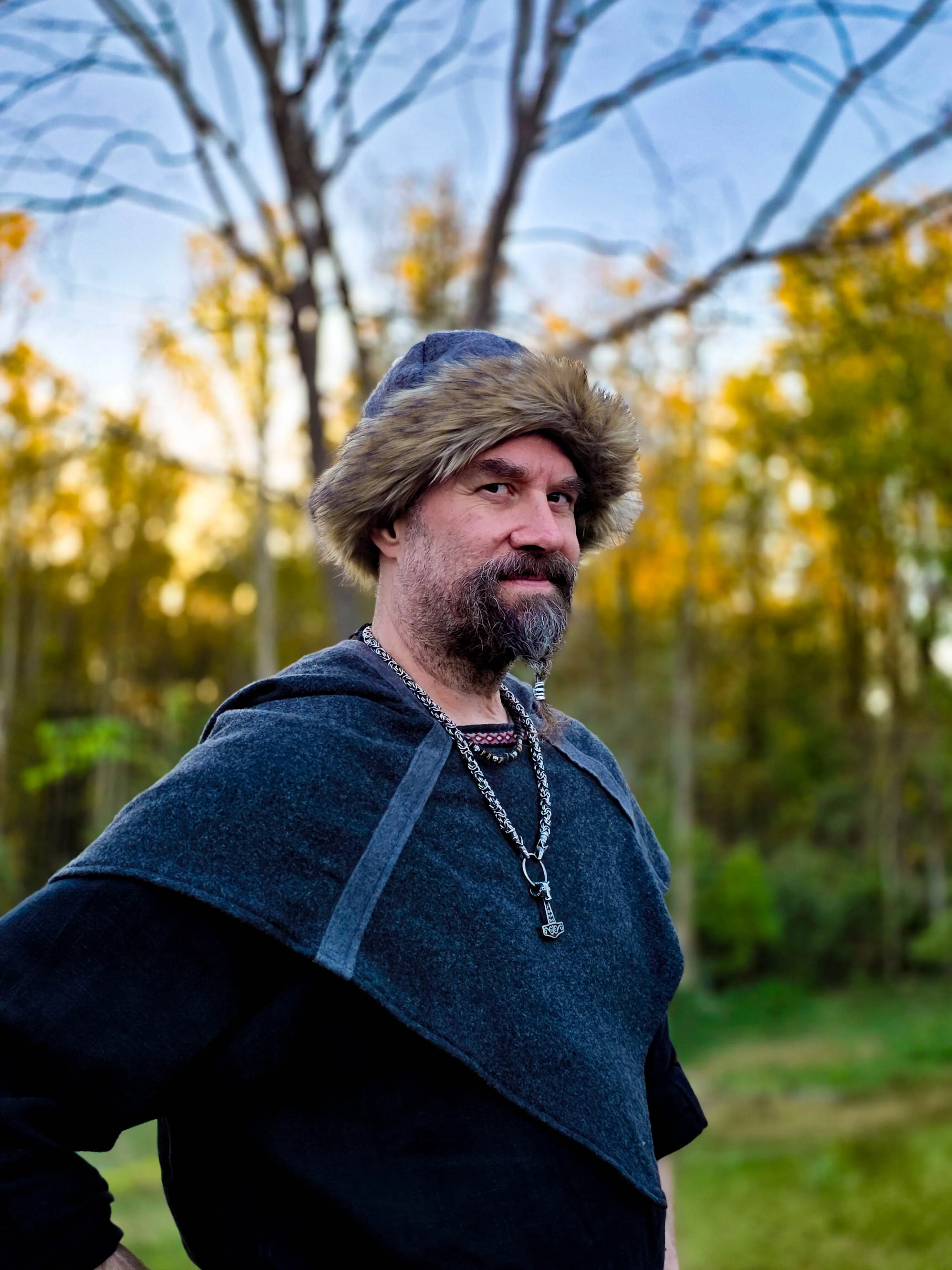 Smedis in a fur hat and wool hood